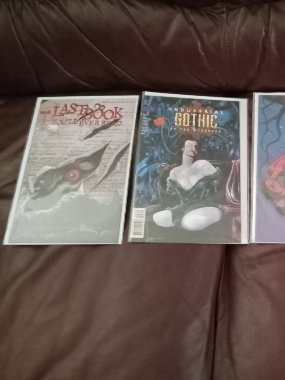 Lot of four assorted comics in sleeves in great condition